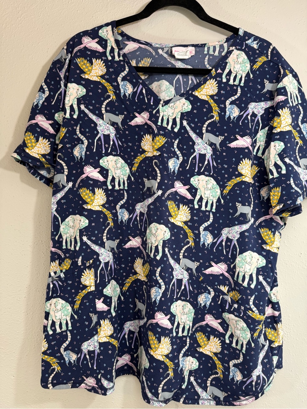 Scrubstar Navy Animal Print  scrub Top with Pastel Accents